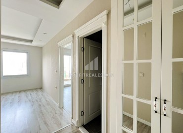 Элегантная двухкомнатная квартира, 55м², в комфортабельном комплексе в районе Томюк, Мерсин ID-15375 фото-3