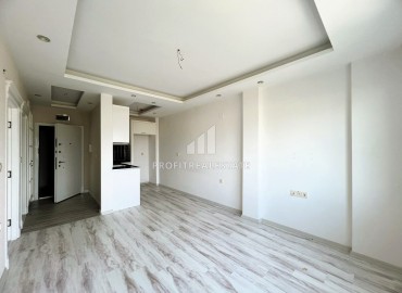 Elegant one-bedroom apartment, 55m², in a comfortable residence in the Tomyuk area, Mersin ID-15375 фото-4