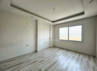 Elegant one-bedroom apartment, 55m², in a comfortable residence in the Tomyuk area, Mersin ID-15375 фото-7
