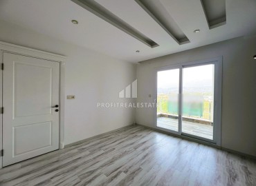 Elegant one-bedroom apartment, 55m², in a comfortable residence in the Tomyuk area, Mersin ID-15375 фото-9