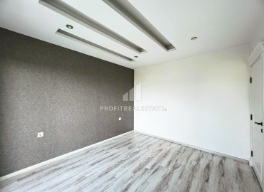 Elegant one-bedroom apartment, 55m², in a comfortable residence in the Tomyuk area, Mersin ID-15375 фото-10