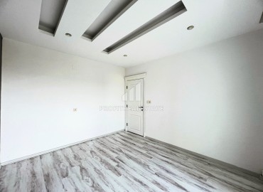 Elegant one-bedroom apartment, 55m², in a comfortable residence in the Tomyuk area, Mersin ID-15375 фото-11