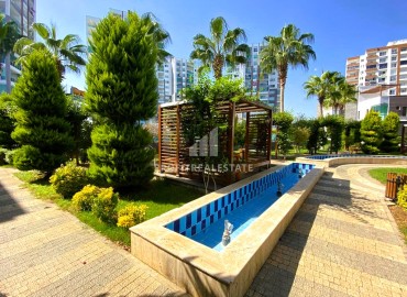 Elegant one-bedroom apartment, 55m², in a comfortable residence in the Tomyuk area, Mersin ID-15375 фото-17