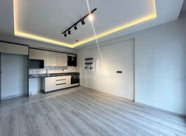 One bedroom apartment, 60m², in a new building with good facilities 550m from the sea in Erdemli, Arpacbakhsis ID-15376 фото-7