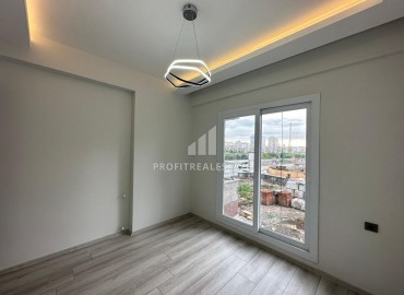 One bedroom apartment, 60m², in a new building with good facilities 550m from the sea in Erdemli, Arpacbakhsis ID-15376 фото-11
