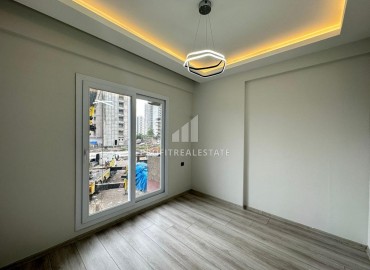 One bedroom apartment, 60m², in a new building with good facilities 550m from the sea in Erdemli, Arpacbakhsis ID-15376 фото-12