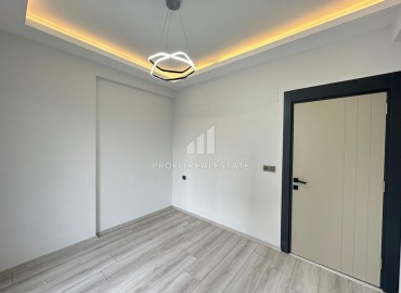 One bedroom apartment, 60m², in a new building with good facilities 550m from the sea in Erdemli, Arpacbakhsis ID-15376 фото-14
