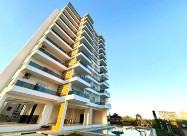 One bedroom apartment, 60m², in a cozy new residence in the Tomyuk area, Mersin ID-15377 фото-1