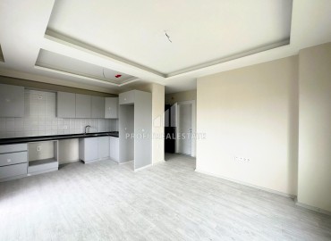 Квартира с одной спальней, 60м², в уютном новом комплексе в районе Томюк, Мерсин ID-15377 фото-6