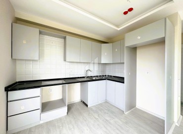 Квартира с одной спальней, 60м², в уютном новом комплексе в районе Томюк, Мерсин ID-15377 фото-8
