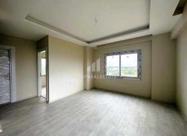 One bedroom apartment, 60m², in a cozy new residence in the Tomyuk area, Mersin ID-15377 фото-9
