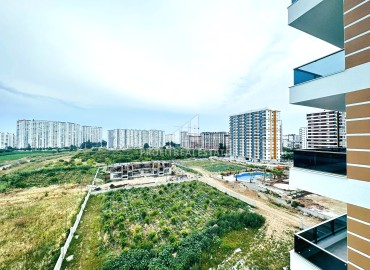 One bedroom apartment, 60m², in a cozy new residence in the Tomyuk area, Mersin ID-15377 фото-15