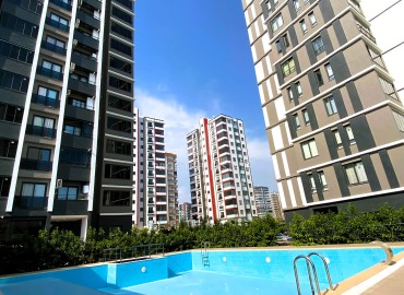 Cozy two bedroom apartment, 115m², in a new residence with facilities, in the Mersin - Soli area ID-15379 фото-1