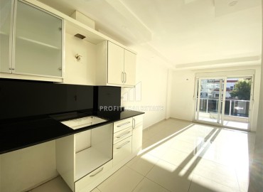 Bright two bedroom apartment 90 m², unfurnished, 200 meters from the sea, in the very center of Alanya ID-15385 фото-6