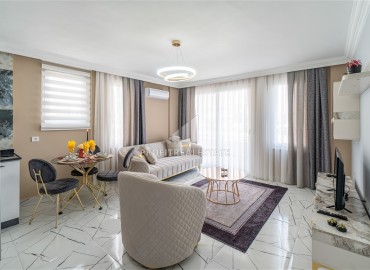 Alanya center: furnished 1+1 apartment with two balconies, 70m², mountain views with designer interior ID-15393 фото-3