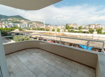 Alanya center: furnished 1+1 apartment with two balconies, 70m², mountain views with designer interior ID-15393 фото-12