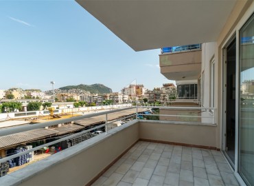 Alanya center: furnished 1+1 apartment with two balconies, 70m², mountain views with designer interior ID-15393 фото-13
