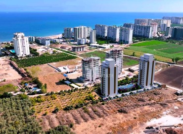 Apartment 1+1 and 2+1, 60-95m², in a premium class residence under construction in Teje, Mersin, with installments from the developer ID-15406 фото-8