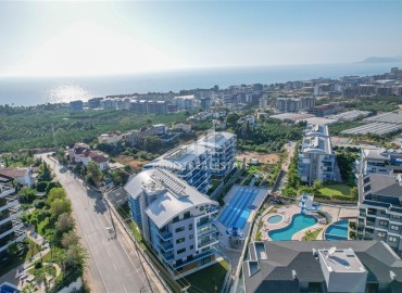 Luxurious two-level apartment 2+1, 110 m² with a terrace and designer interior, Kargicak, Alanya ID-15408 фото-2