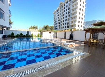 One-bedroom apartment, 55m², in a residence built in 2023, with good facilities in Mahmutlar, Alanya ID-15413 фото-2
