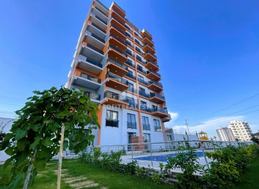 Отличная новая квартира с одной спальней, 55м², с видом на море, в уютной резиденции в районе Аяш, Эрдемли ID-15423 фото-2