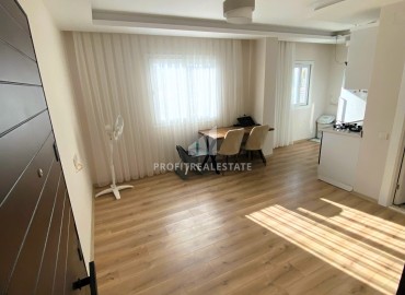 Новая частично меблированная квартира с одной спальней, 50м² в Эрдемли, район Алата ID-15427 фото-3