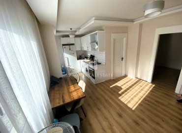 Новая частично меблированная квартира с одной спальней, 50м² в Эрдемли, район Алата ID-15427 фото-4