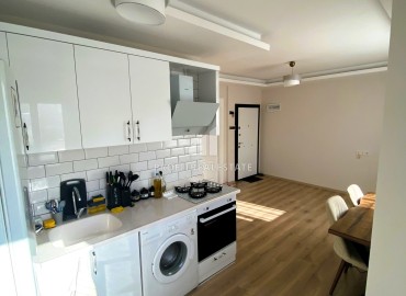 Новая частично меблированная квартира с одной спальней, 50м² в Эрдемли, район Алата ID-15427 фото-6