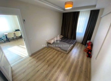 Новая частично меблированная квартира с одной спальней, 50м² в Эрдемли, район Алата ID-15427 фото-7