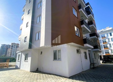 Новая частично меблированная квартира с одной спальней, 50м² в Эрдемли, район Алата ID-15427 фото-17