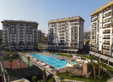 Новая двухкомнатная квартира в резиденции с инфраструктурой отеля, Авсаллар, Аланья, 55 м2 ID-15439 фото-1