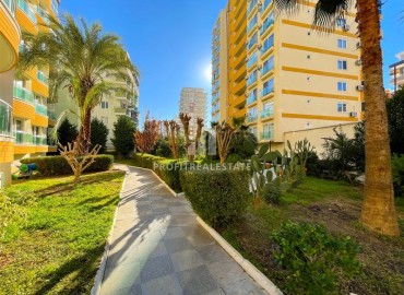Elegant one-bedroom apartment 60m², with glazed balcony, in a residence with facilities in Mahmutlar, Alanya ID-15443 фото-12