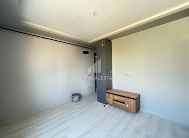 Двухкомнатная квартира, 50м², с чистовой отделкой в малоквартирной резиденции в Мезитли, Мерсин ID-15460 фото-4