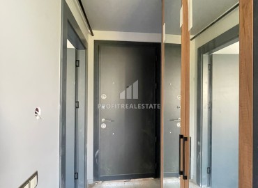 Двухкомнатная квартира, 50м², с чистовой отделкой в малоквартирной резиденции в Мезитли, Мерсин ID-15460 фото-5