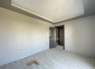 Двухкомнатная квартира, 50м², с чистовой отделкой в малоквартирной резиденции в Мезитли, Мерсин ID-15460 фото-9