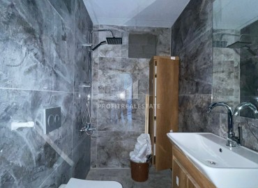 Двухкомнатная квартира, 50м², с чистовой отделкой в малоквартирной резиденции в Мезитли, Мерсин ID-15460 фото-10