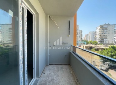 Двухкомнатная квартира, 50м², с чистовой отделкой в малоквартирной резиденции в Мезитли, Мерсин ID-15460 фото-12