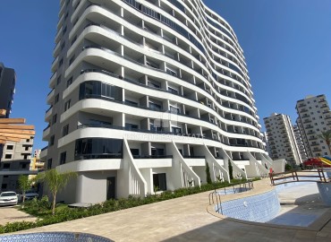 Новая двухкомнатная квартира, 65м², в элитной резиденции 2023 года постройки в Арпачбахшиш, Эрдемли ID-15464 фото-2