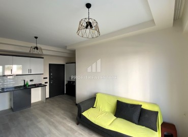 Новые апартаменты 1+1, 50м², с личной террасой в газифицированном комплексе в Тедже, Мерсин ID-15466 фото-4