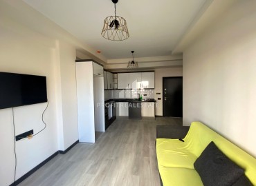 New apartment 1+1, 50m², with a private terrace in a gasified residence in Teje, Mersin ID-15466 фото-6