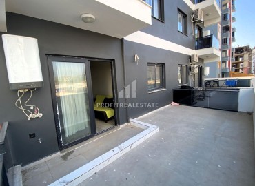 New apartment 1+1, 50m², with a private terrace in a gasified residence in Teje, Mersin ID-15466 фото-10