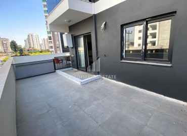 New apartment 1+1, 50m², with a private terrace in a gasified residence in Teje, Mersin ID-15466 фото-11