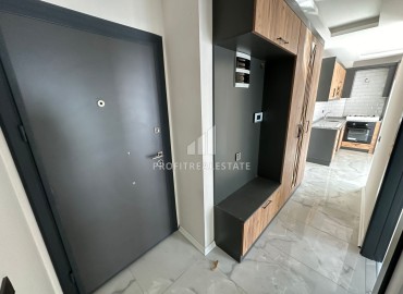 Two bedroom apartment, 90m², in a new urban building in the center of Yenisehir, Mersin ID-15476 фото-2