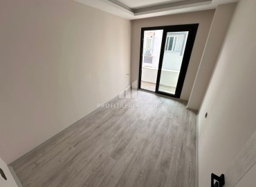 Two bedroom apartment, 90m², in a new urban building in the center of Yenisehir, Mersin ID-15476 фото-7