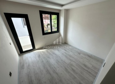 Two bedroom apartment, 90m², in a new urban building in the center of Yenisehir, Mersin ID-15476 фото-9