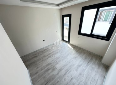 Two bedroom apartment, 90m², in a new urban building in the center of Yenisehir, Mersin ID-15476 фото-10