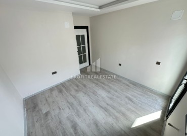 Two bedroom apartment, 90m², in a new urban building in the center of Yenisehir, Mersin ID-15476 фото-11