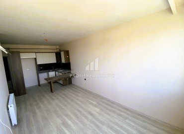 Stylish one bedroom apartment, 55 m² in a comfortable new building in Yenisehir, Ciftlikkoy ID-15480 фото-3
