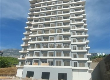 Inexpensive one bedroom apartment in a new residence in 2023, Mahmutlar, Alanya, 50 m2 ID-15486 фото-1