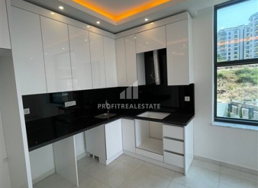 One bedroom apartment, 55m², in an elite new building in Mahmutlar, 650m from the sea, Alanya ID-15543 фото-4